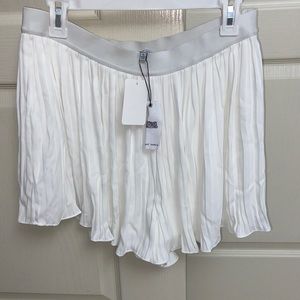 White pleated skort